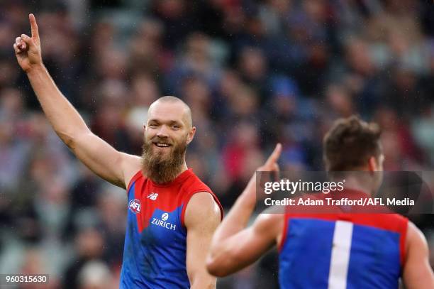 Max Gawn of the Demons celebrates a goal during the 2018 AFL round nine match between the Carlton Blues and the Melbourne Demons at the Melbourne...