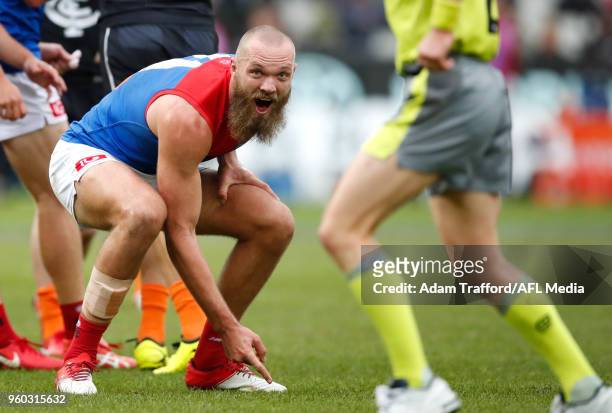 Max Gawn of the Demons argues with the umpire after having a 50m penalty paid against him after he smothered a kick from Harry McKay of the Blues...