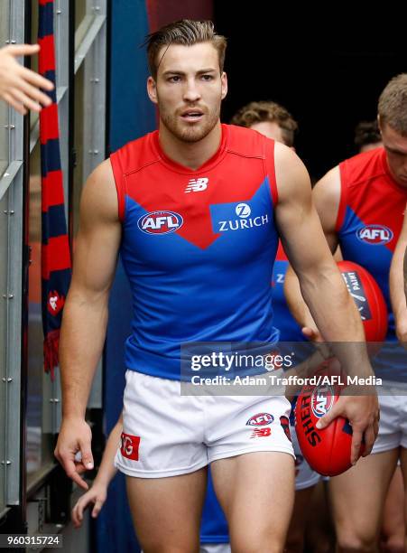 Jack Viney of the Demons leads the team up the race in his return from injury during the 2018 AFL round nine match between the Carlton Blues and the...
