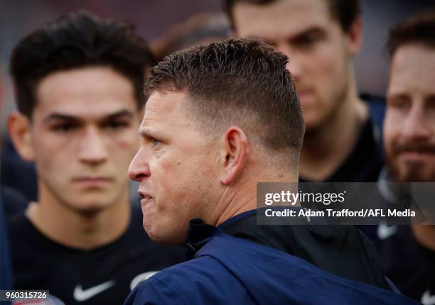 Brendon Bolton, Senior Coach of the Blues addresses his players during the 2018 AFL round nine match between the Carlton Blues and the Melbourne...