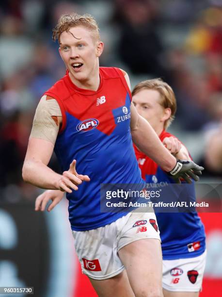 Clayton Oliver of the Demons celebrates a goal during the 2018 AFL round nine match between the Carlton Blues and the Melbourne Demons at the...