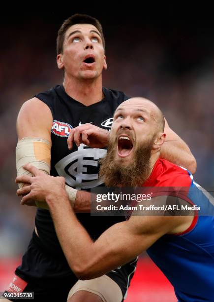 Matthew Kreuzer of the Blues and Max Gawn of the Demons compete in a ruck contest during the 2018 AFL round nine match between the Carlton Blues and...