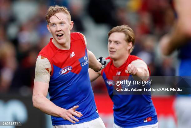 Clayton Oliver of the Demons celebrates a goal during the 2018 AFL round nine match between the Carlton Blues and the Melbourne Demons at the...