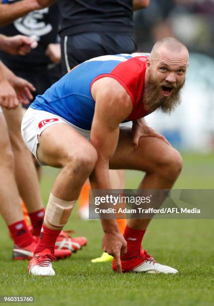 Max Gawn of the Demons argues with the umpire after having a 50m penalty paid against him after he smothered a kick from Harry McKay of the Blues...