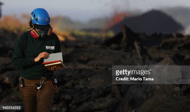 Geologist inspects a recent Lava flow from a Kilauea volcano fissure on Hawaii's Big Island on May 19, 2018 in Kapoho, Hawaii. The U.S. Geological...