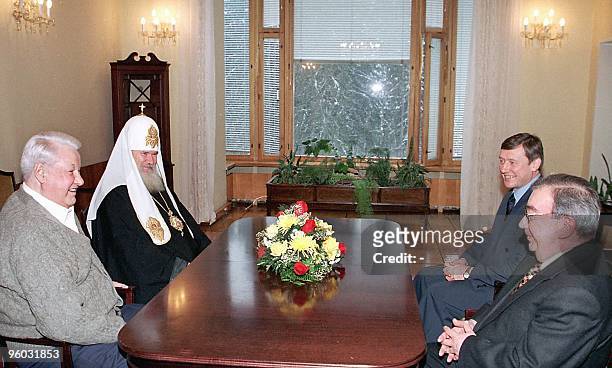 Russian President Boris Yeltsin receives the congratulations from the Patriarch of Moscow and All Russia Alexi II, the president's administration...