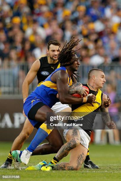 Nic Naitanui of the Eagles tackles Dustin Martin of the Tigers during the round nine AFL match between the West Coast Eagles and the Richmond Tigers...