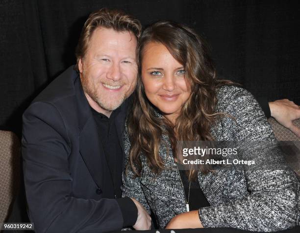 Actor Christopher May and actress Miracle Laurie attend WhedonCon 2018 held at Warner Center Marriott on May 19, 2018 in Woodland Hills, California.