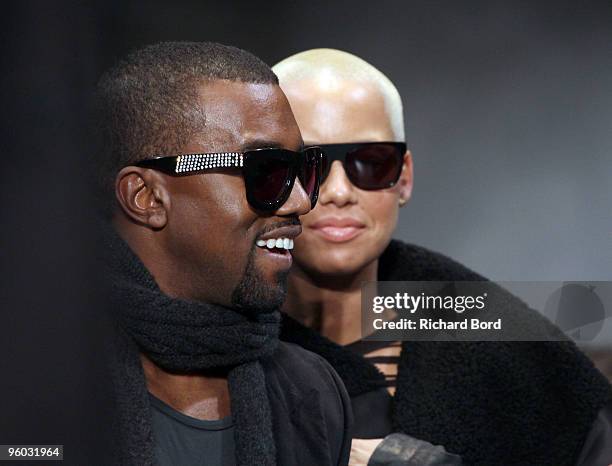 Kanye West and Amber Rose attend the Cerruti fashion show during Paris Menswear Fashion Week Autumn/Winter 2010 at Palais de Tokyo on January 22,...