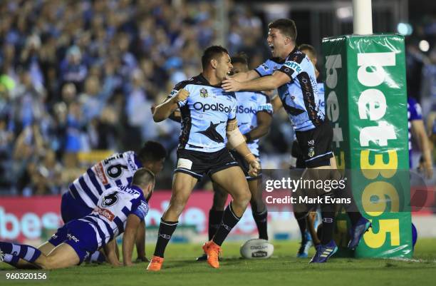 Jesse Ramien of the Sharks celebrates a try during the round 11 NRL match between the Cronulla Sharks and the Canterbury Bulldogs at Southern Cross...