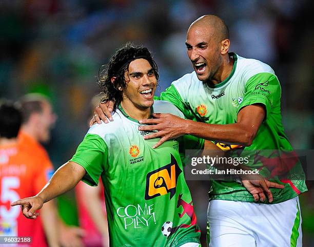 David Williams and Dyron Daal of the Fury celebrate after David Wiliams scored the equalising goal during the round 24 A-League match between the...