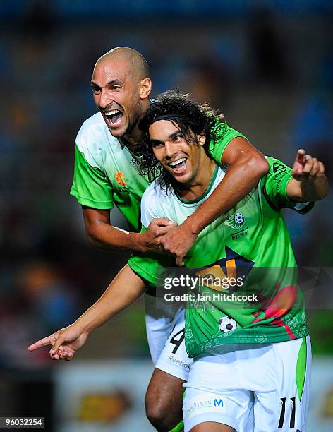 David Williams and Dyron Daal of the Fury celebrate after David Wiliams scored the equalising goal during the round 24 A-League match between the...