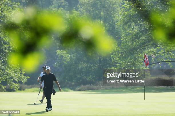 David Drysdale of Scotland walks off the 1st green during his quater final match against Victor Perez of France during the final day of the Belgian...