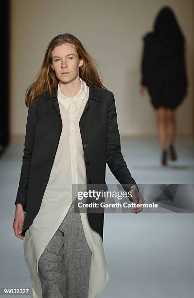 Model walks the runway at the Michael Sontag Fashion Show during the Mercedes-Benz Fashion Week Berlin Autumn/Winter 2010 at the Bebelplatz on...