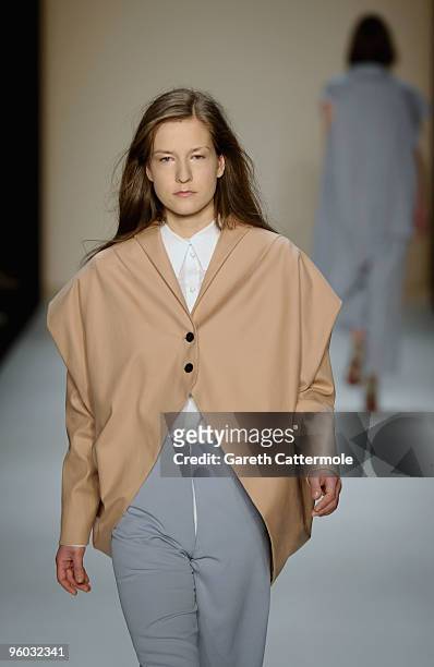 Model walks the runway at the Michael Sontag Fashion Show during the Mercedes-Benz Fashion Week Berlin Autumn/Winter 2010 at the Bebelplatz on...