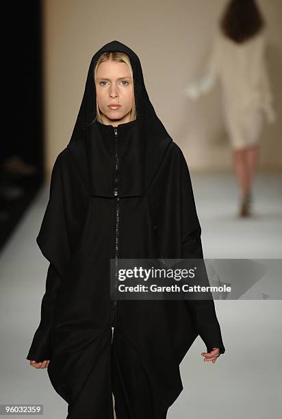 Model walks the runway at the Michael Sontag Fashion Show during the Mercedes-Benz Fashion Week Berlin Autumn/Winter 2010 at the Bebelplatz on...