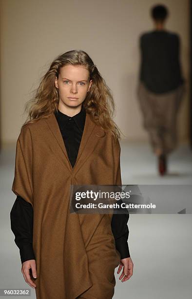 Model walks the runway at the Michael Sontag Fashion Show during the Mercedes-Benz Fashion Week Berlin Autumn/Winter 2010 at the Bebelplatz on...