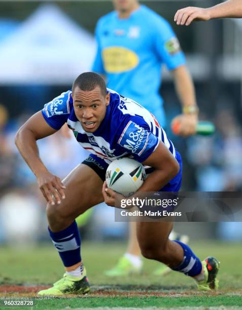 Moses Mbye of the Bulldogs runs the ball during the round 11 NRL match between the Cronulla Sharks and the Canterbury Bulldogs at Southern Cross...