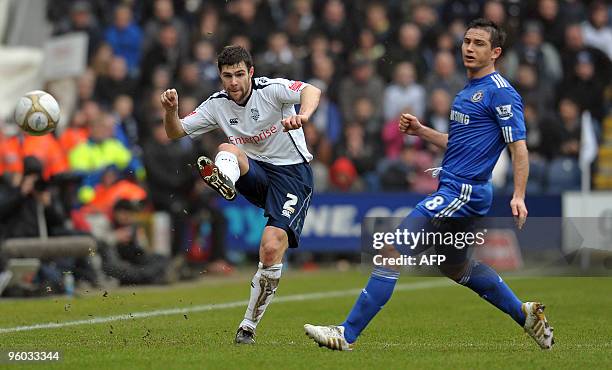 Preston North End's Scottish defender Michael Hart passes the ball beyond Chelsea's English midfielder Frank Lampard during the FA Cup fourth round...