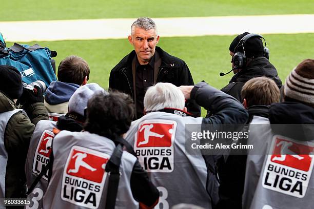New head coach Mirko Slomka of Hannover is surrounded by photographers before the Bundesliga match between FSV Mainz 05 and Hannover 96 at the...