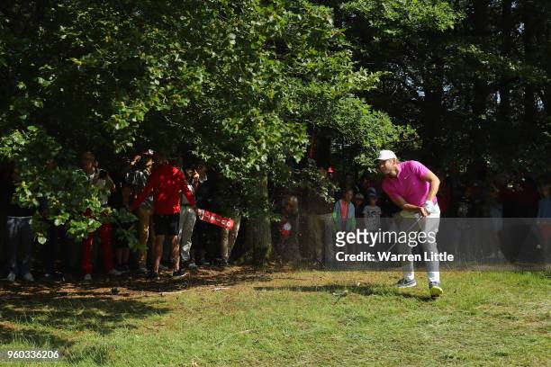 James Heath of England lines up his second shot on the 9th hole during his quater final match against Nicolas Colsaerts of Belgium during the final...