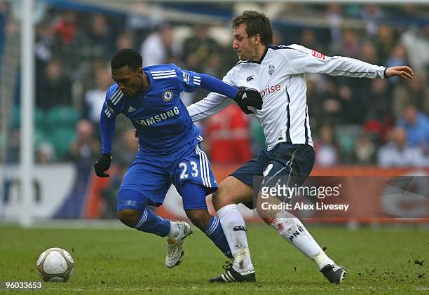 Daniel Sturridge of Chelsea cholds off the challenge of Chris Brown of Preston North End during the FA Cup sponsored by E.ON Fourth round match...