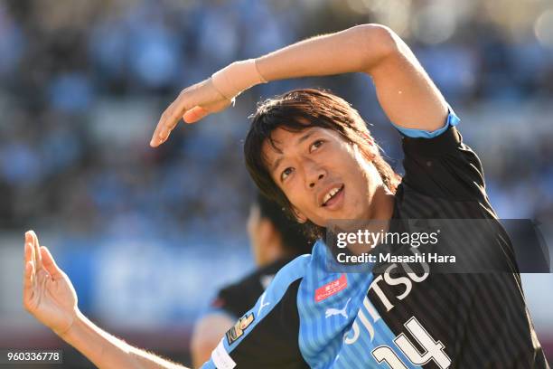 Kengo Nakamura of Kawasaki Frontale dances "C" of the "YMCA" from "Young Man" by Japanese singer Hideki Saijo after the third goal of Kawasaki...