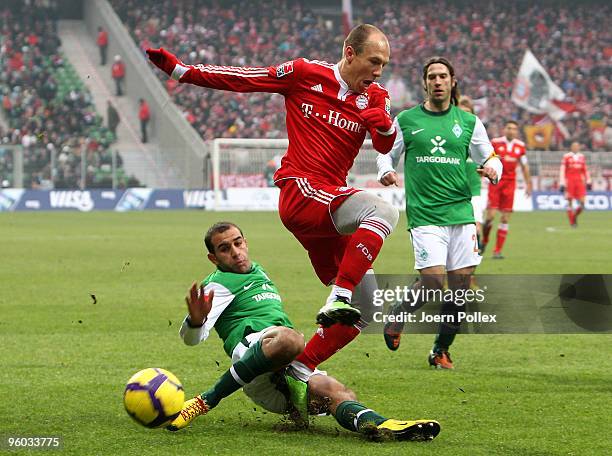 Aymen Abdennour of Bremen and Arjen Robben of Muenchen compete for the ball during the Bundesliga match between Werder Bremen and FC Bayern Muenchen...
