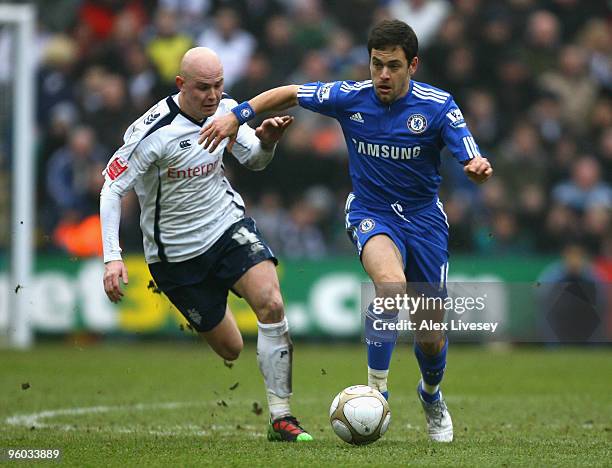 Richard Chaplow of Preston North End battles for the ball with Joe Cole of Chelsea during the FA Cup sponsored by E.ON Fourth round match between...