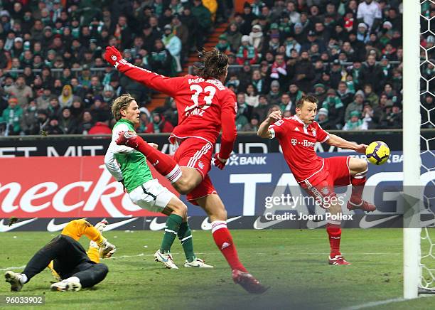 Ivica Olic of Muenchen scores his team's second goal during the Bundesliga match between Werder Bremen and FC Bayern Muenchen at Weser Stadium on...
