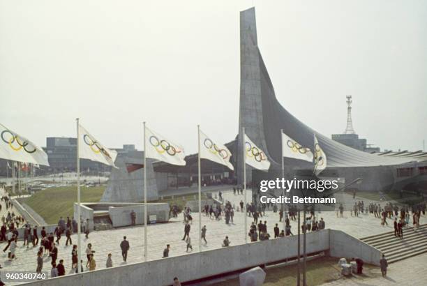 View of the Olympic flags flying at Komazowa park.