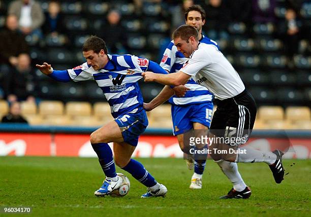 Jake Buxton of Derby County and Billy Sharp of Doncaster Rovers battle for the ball during the FA Cup 4th Round match between Derby County and...