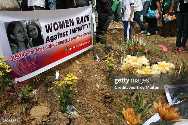 Family members, friends, supporters and peace advocates offer prayers at the site where 57 people, including journalists, were massacred on November...