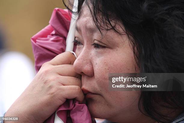 Woman mourns the 57 people killed in a massacre on November 23, 2009 at the site of massacre on January 23, 2010 in the township of Ampatuan,...