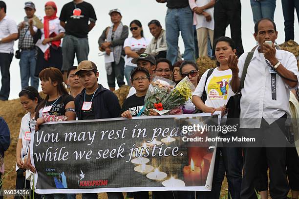 Family members, friends, supporters and peace advocates offer prayers at the site where 57 people, including journalists, were massacred on November...