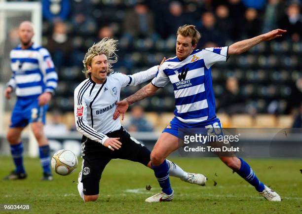 Robbie Savage of Derby County and James Coppinger of Doncaster Rovers battle for the ball during the FA Cup 4th Round match between Derby County and...