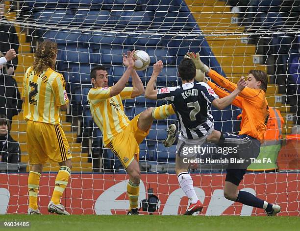 Jose Enrique and Tim Krul of Newcastle are unable to stop a goal from Jonas Olsson of West Bromwich while under pressure from Robert Kohen of West...