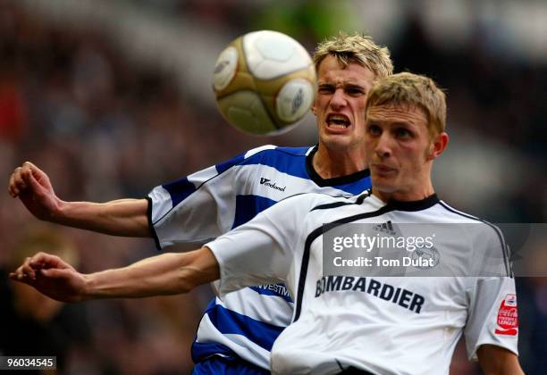 Dean Moxey of Derby County and Dean Sheils of Doncaster Rovers battle for the ball during the FA Cup 4th Round match between Derby County and...