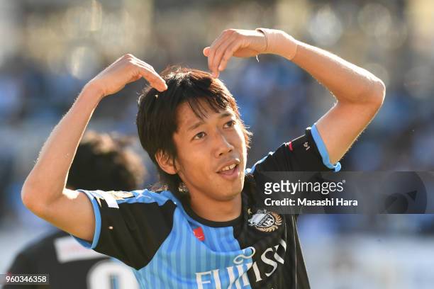 Kengo Nakamura of Kawasaki Frontale dances "M" of the "YMCA" from "Young Man" by Japanese singer Hideki Saijo after the third goal of Kawasaki...