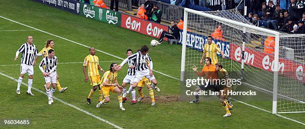 Jonas Olsson scores the first goal during the fourth round match of The FA Cup, sponsored by E.ON, between West Bromwich Albion and Newcastle United...