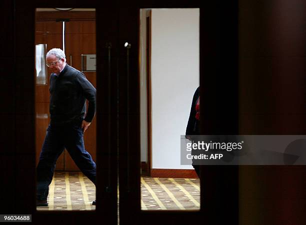 Northern Ireland's Deputy First Minister Martin McGuinness leaves a Sinn Fein meeting during a break at the Raddison hotel in Dublin, Ireland January...