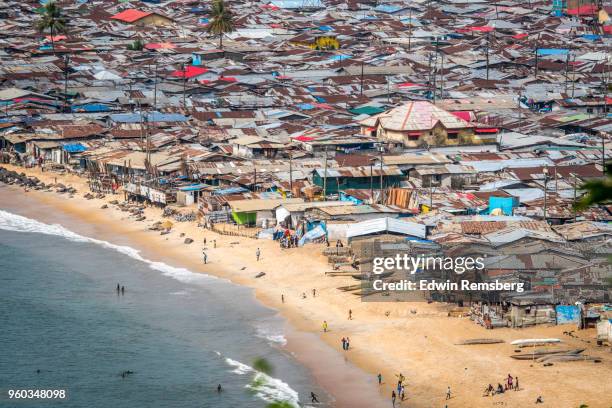 crowded city - liberia stock-fotos und bilder