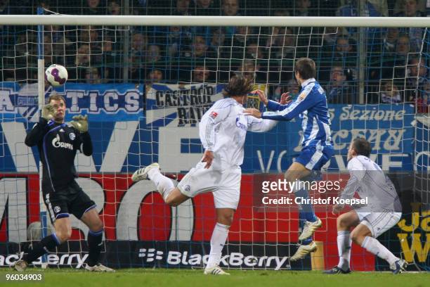 Stanislav Sestak of Bochum scores the second goal against Manuel Neuer , Marcelo Bordon and Lukas Schmitz during the Bundesliga match between VfL...