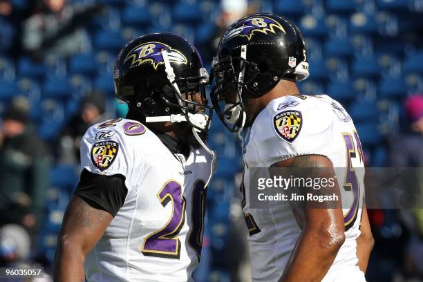 Ed Reed and Ray Lewis of the Baltimore Ravens warm up against the New England Patriots during the 2010 AFC wild-card playoff game at Gillette Stadium...