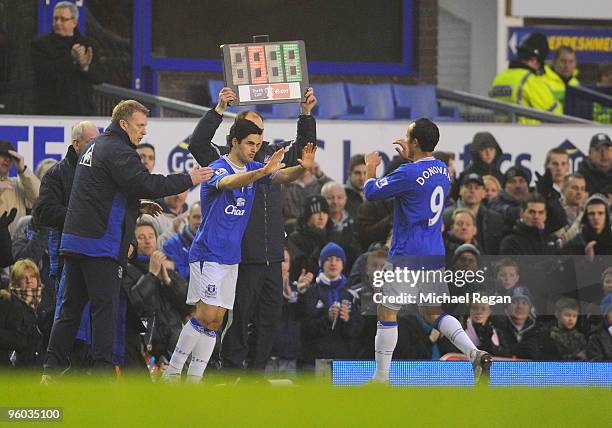 Everton manager David Moyes brings on Mikel Arteta for Landon Donovan during the FA Cup 4th Round match between Everton and Birmingham City at...