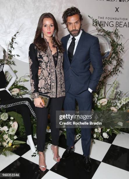 Hanane Thompson and Marc Ange attend The Foundation for Living Beauty Dinner Under the Stars on May 19, 2018 in Beverly Hills, California.