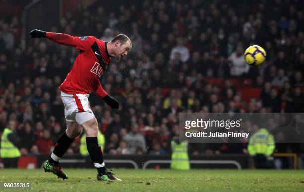Wayne Rooney of Manchester United scores a header and completes a hat-trick during the Barclays Premier League match between Manchester United and...