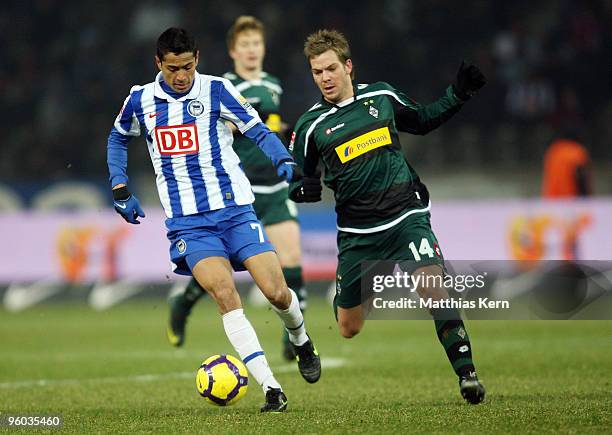 Cicero of Berlin battles for the ball with Thorben Marx of Moenchengladbach during the Bundesliga match between Hertha BSC Berlin and Borussia...