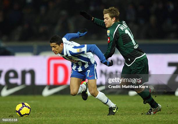 Cicero of Berlin battles for the ball with Thorben Marx of Moenchengladbach during the Bundesliga match between Hertha BSC Berlin and Borussia...