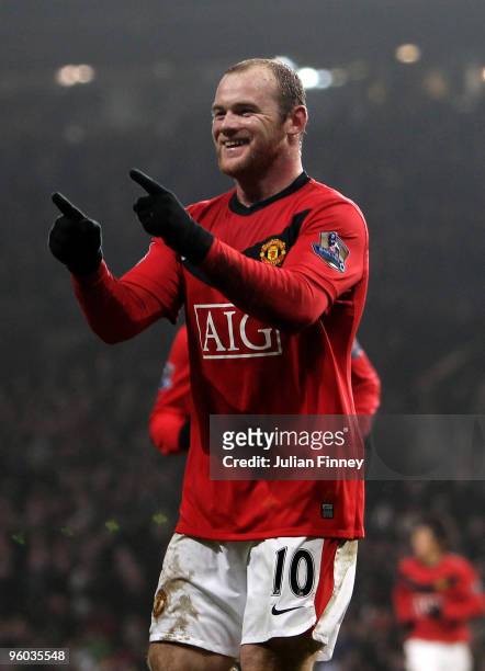 Wayne Rooney of Manchester United celebrates scoring his hat-trick during the Barclays Premier League match between Manchester United and Hull City...